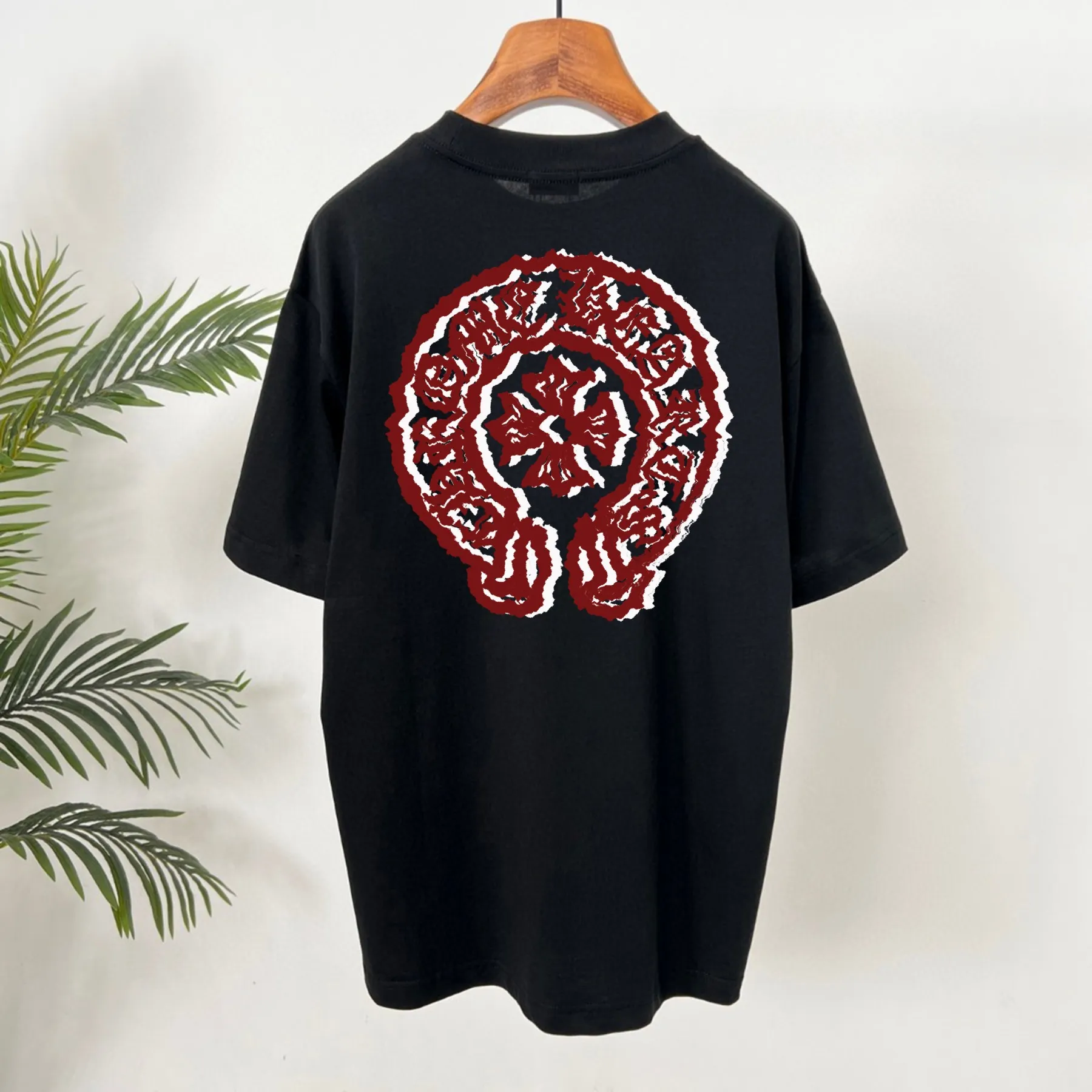 🅿️190 Crow Heart’s new summer T-shirt! This Sanskrit cross printed round neck short sleeves is simply a must-have for fashionistas. Salona cotton fabric is super comfortable, soft and skin-friendly, and has excellent breathability, making it perfect for summer wear. The Sanskrit cross print design on it is amazing, full of mystery and high-end, and the details are so exquisite that it makes people scream. It is worthy of Kroxin, and it vividly interprets the trend and personality. The loose fit is super friendly to all body shapes, covers the flesh and is comfortable, and looks good no matter how you wear it. Pair it with jeans and you'll look cool on the street. Pair it with sweatpants and you'll instantly look energetic and trendy. When you wear it and go out, you will feel like you are the spokesperson of fashion, and it will definitely turn heads. Color: black, white Size: S-2XL
